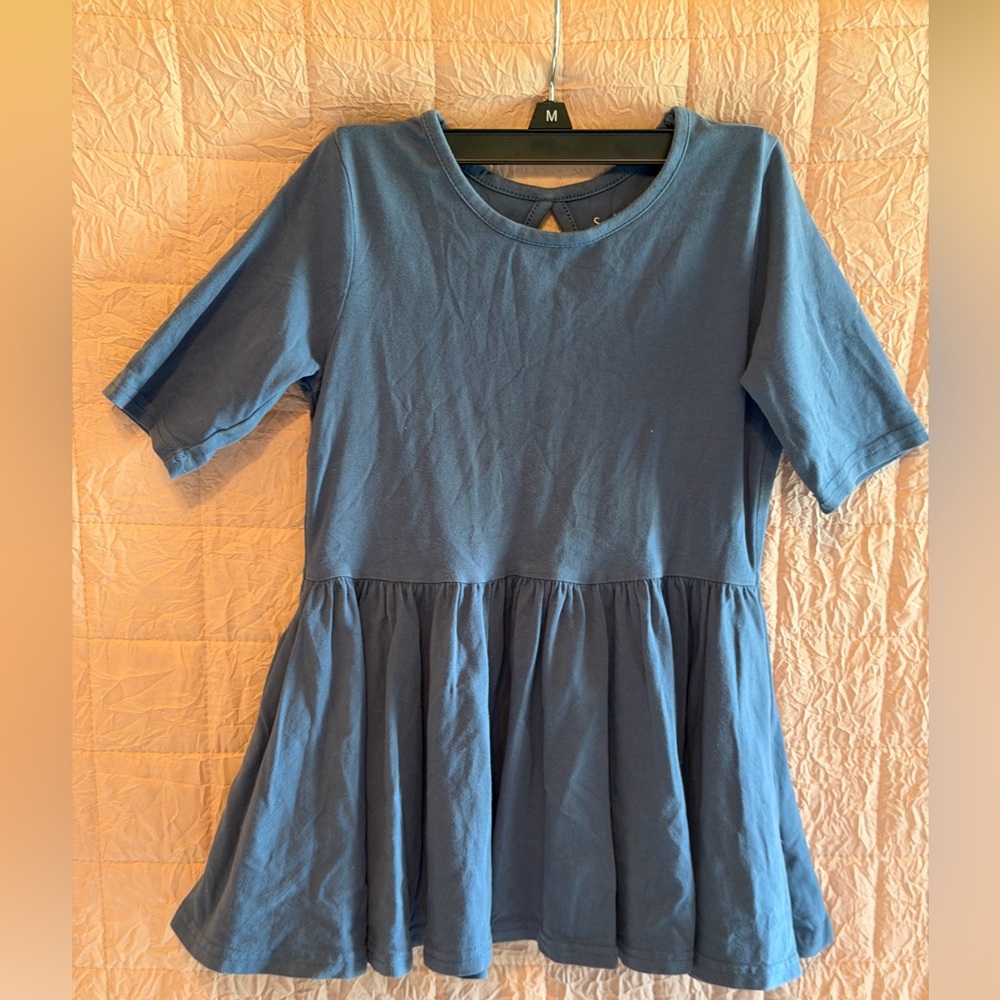 Blue Kids Top with eyelet on back and a twirling bottom that girls love!